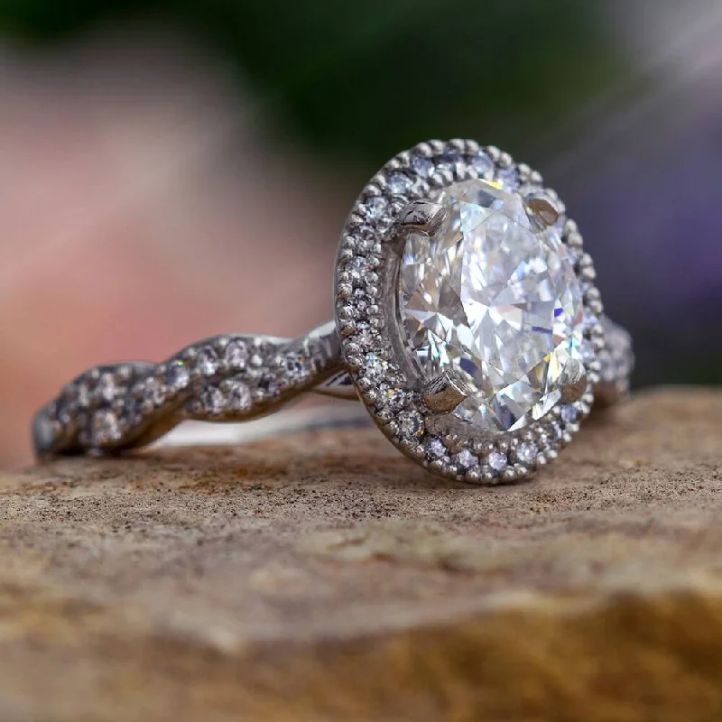 Platinum Engagement Ring with Oval Shaped Diamond Halo