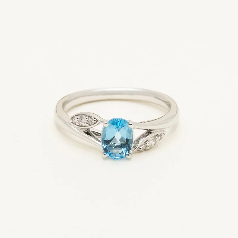 Oval Blue Topaz Ring in 14kt White Gold with Diamonds (1/10ct tw)