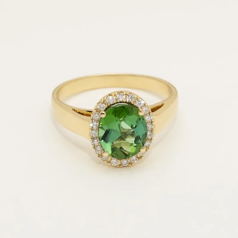 Oval Green Tourmaline Ring in 18kt Yellow Gold with Diamond Halo (1/7ct tw)