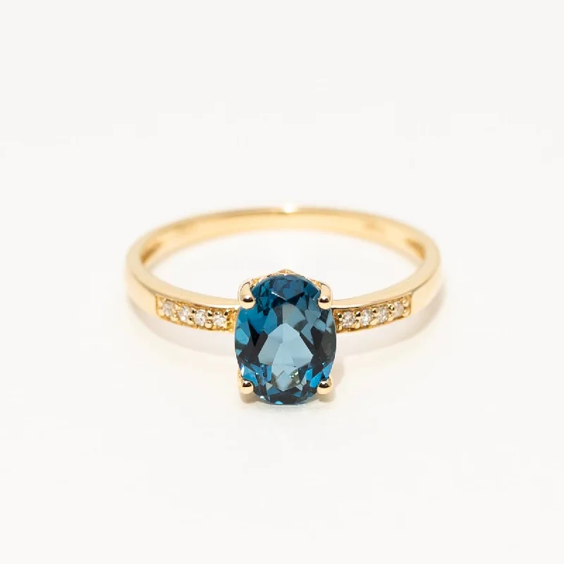 Oval London Blue Topaz Ring in 14kt Yellow Gold with Diamonds (.03ct tw)