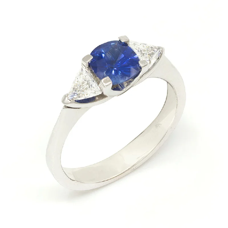 Three Stone Engagement Ring with Sapphire and Triagonal side Diamonds